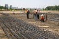 construction, sitework, preparation, work crew, tying pier steel